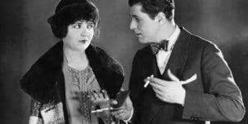 vintage B&W woman looking suspiciously at man offering her a cigarette