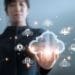 woman holding virtual cloud icon