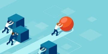 businessmen pushing blocks with man in lead rolling a ball