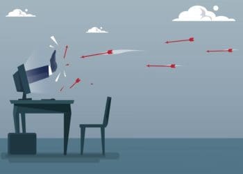 hand from computer screen deflecting red arrows