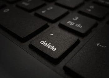 closeup of delete button on black keyboard