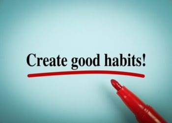 "create good habits" on blue background underlined with red marker