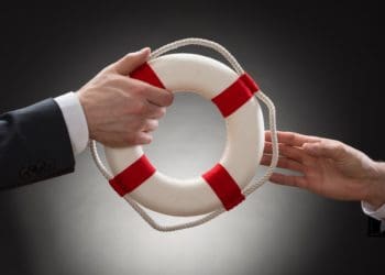 two hands passing a lifesaver