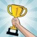 pop art illustration of hand holding trophy