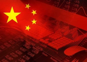 chinese flag with stock ticker in background