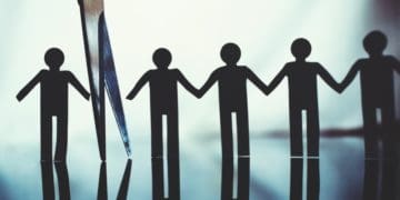 scissors separating paper dolls, boycott concept