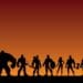 silhouettes of the avengers on dusky orange background