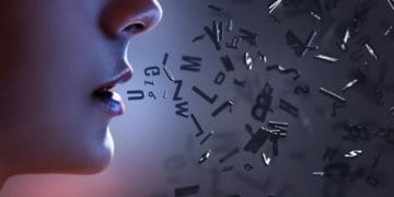 woman in profile speaking jumbled letters