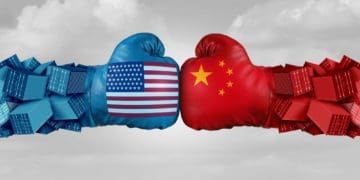 U.S. and Chinese flags on opposing boxing gloves representing trade war