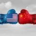 U.S. and Chinese flags on opposing boxing gloves representing trade war