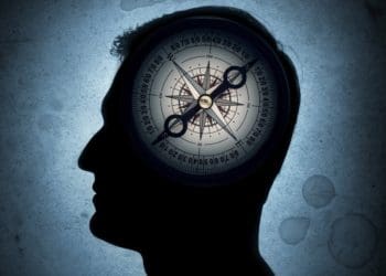 compass on profile of man's head