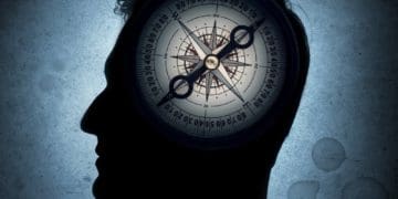 compass on profile of man's head