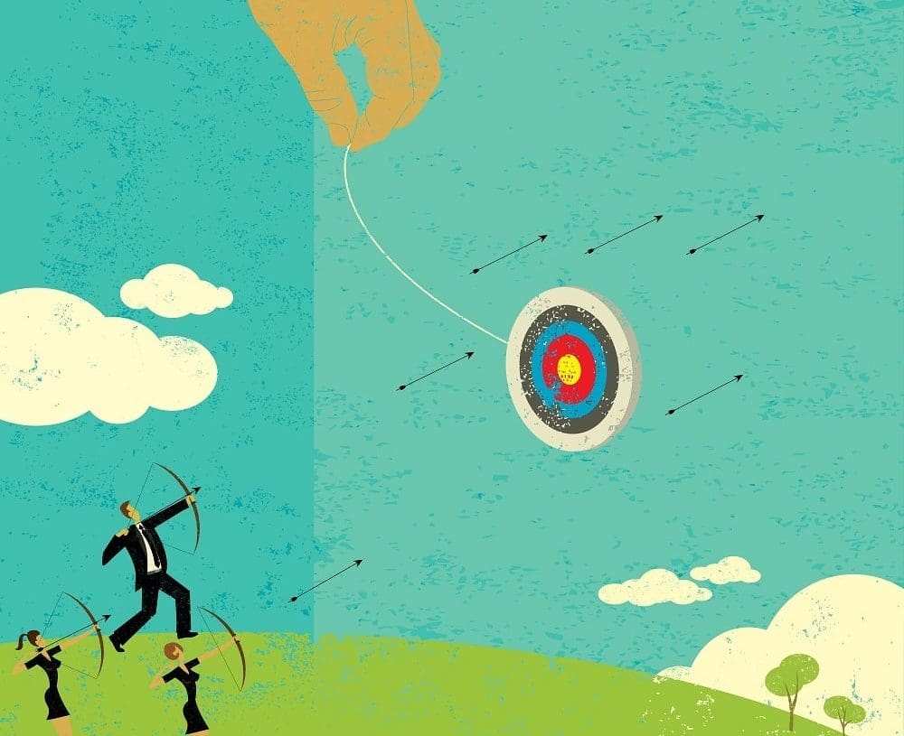 hand swinging target with businesspeople aiming bows and arrows