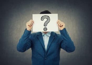 businessman with question mark over his face