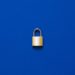 gold lock on blue background