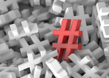 red hashtag on sea of white hashtags