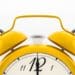 closeup of yellow clock