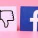 facebook icon and thumbs down reaction on pink background