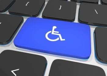 blue keyboard button with handicap symbol