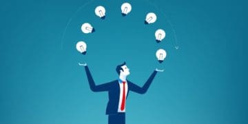 businessman juggling light bulbs