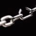 iron chain with one link about to break