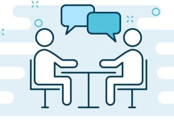 illustration of two figures speaking at a table