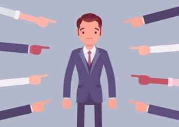 illustration of many hands pointing to businessman looking distressed