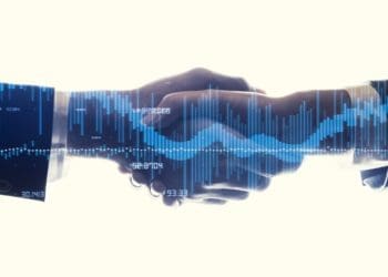 handshake superimposed with stock performance graph