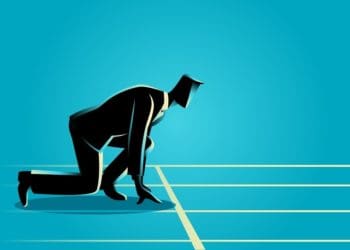 illustration of businessman on track at starting line on blue background