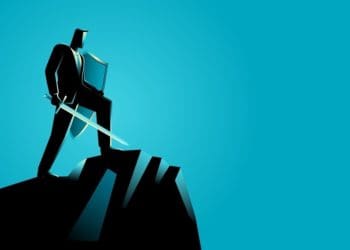 illustration of businessman on mountain peak with sword and shield