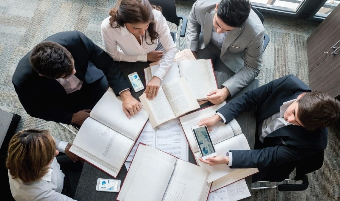 business team around conference table