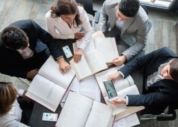 business team around conference table