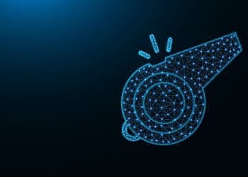 blue polygonal whistle on dark background