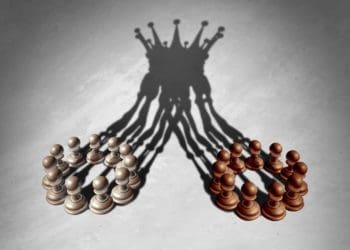 concept of merger, shadow of multiple pawns creating a king's crown