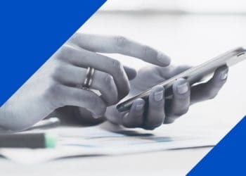 black and white image of woman's hands holding smartphone