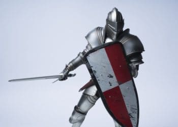 knight in armor holding a sword and shield