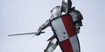 knight in armor holding a sword and shield