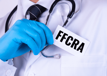 Doctor placing tag in pocket referencing FFCRA