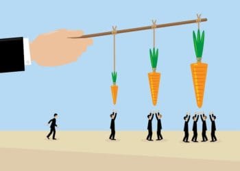 illustration of man holding stick with different sizes of carrots