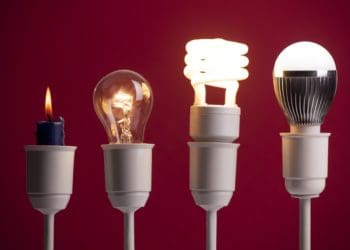 evolution of light bulbs on red background
