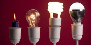 evolution of light bulbs on red background