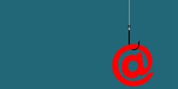 @ symbol on fish hook on dark background