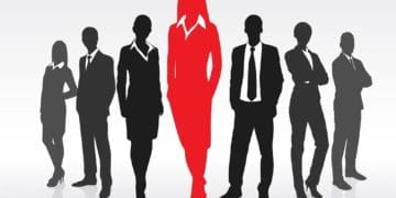 silhouette of businesspeople with center figure in red