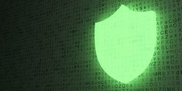 glowing green shield, cybersecurity concept