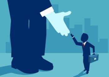 small businessman shaking hand of giant businessman