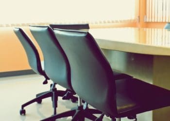 leather chairs in empty boardroom