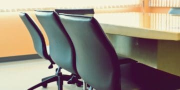leather chairs in empty boardroom