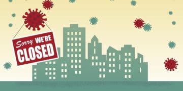 illustration of "closed" sign on city with coronavirus in the air