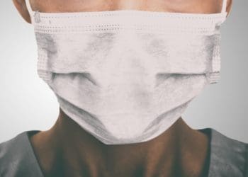 woman wearing surgical mask