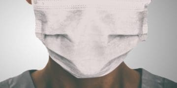 woman wearing surgical mask